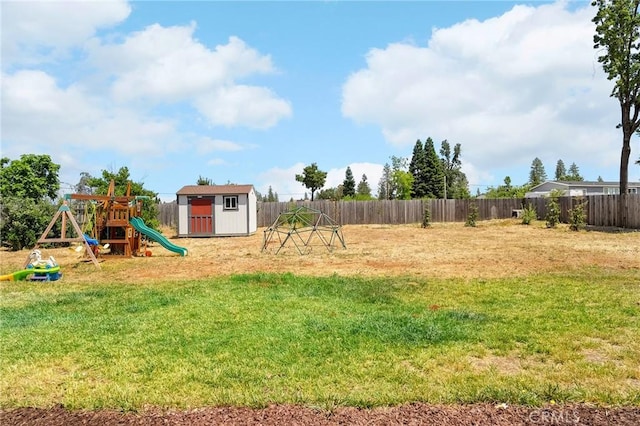 2213 De Mille Rd, Paradise, CA 95969 - fenced backyard featuring a storage shed and a playground