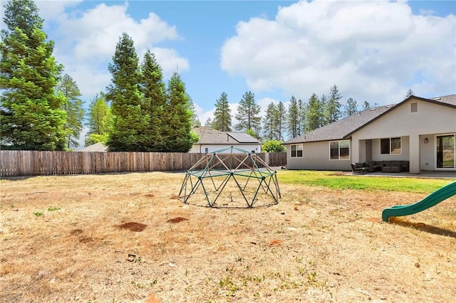 2213 De Mille Rd, Paradise, CA 95969 - fenced backyard with a patio area