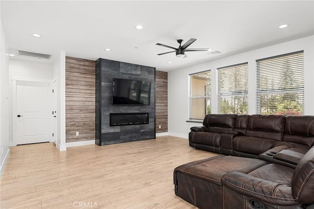 2213 De Mille Rd, Paradise, CA 95969 - living room with ceiling fan, light wood finished floors, recessed lighting, and a fireplace