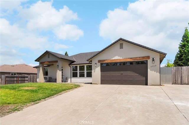 2213 De Mille Rd, Paradise, CA 95969 - single story home with stucco siding, a garage, and concrete driveway