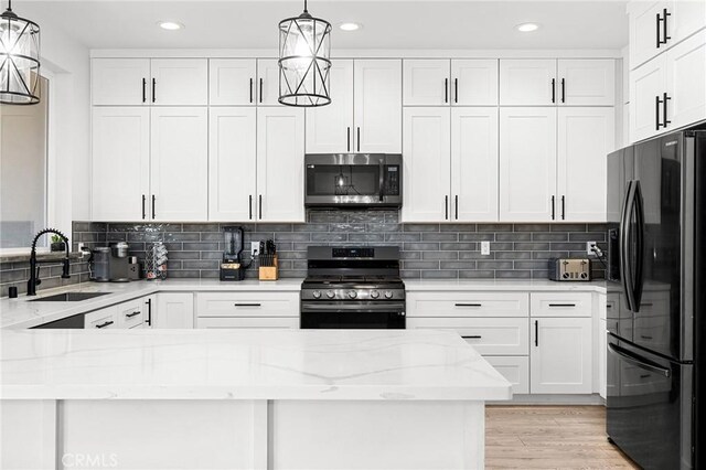 2213 De Mille Rd, Paradise, CA 95969 - kitchen featuring appliances with stainless steel finishes, white cabinets, recessed lighting, light stone counters, and tasteful backsplash