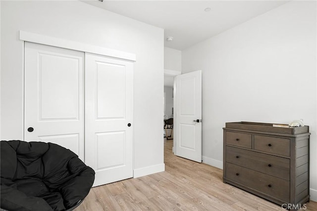 2213 De Mille Rd, Paradise, CA 95969 - sitting room with light wood-style flooring and baseboards