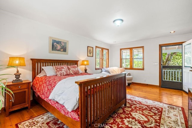 2645 Apple Ln, Julian, CA 92036 - bedroom featuring access to exterior, light wood finished floors, and crown molding