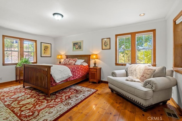 2645 Apple Ln, Julian, CA 92036 - bedroom featuring multiple windows, light wood finished floors, and ornamental molding
