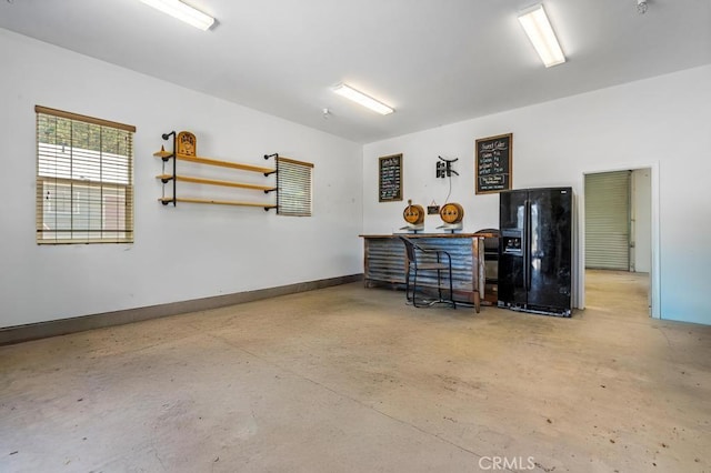 2645 Apple Ln, Julian, CA 92036 - garage featuring black fridge with ice dispenser and baseboards