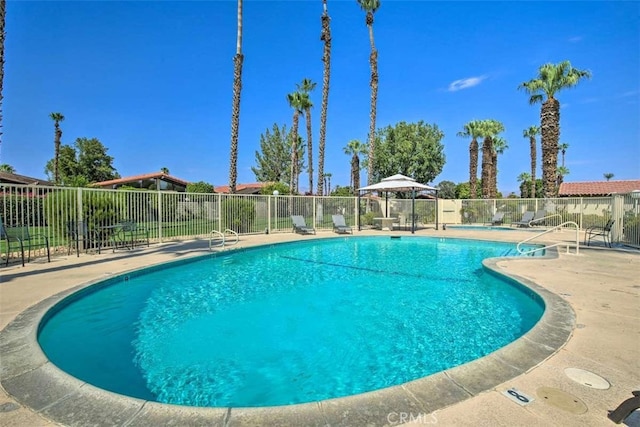 82756 Burnette Dr, Indio, CA 92201 - community pool with a patio area