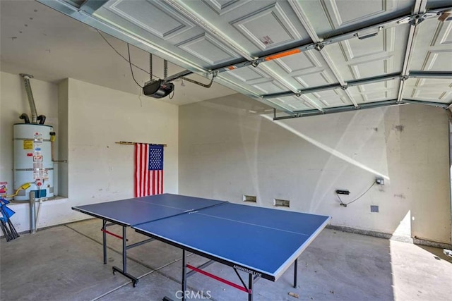 82756 Burnette Dr, Indio, CA 92201 - rec room featuring a garage, water heater, and concrete floors