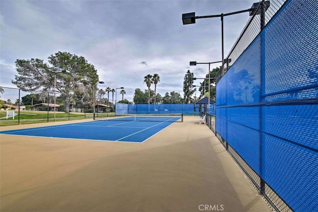 82756 Burnette Dr, Indio, CA 92201 - view of tennis court featuring community basketball court