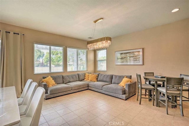 82756 Burnette Dr, Indio, CA 92201 - living area featuring light tile patterned floors, recessed lighting, and a chandelier