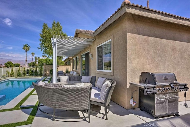82756 Burnette Dr, Indio, CA 92201 - fenced backyard featuring a pergola, area for grilling, a patio, and outdoor lounge area