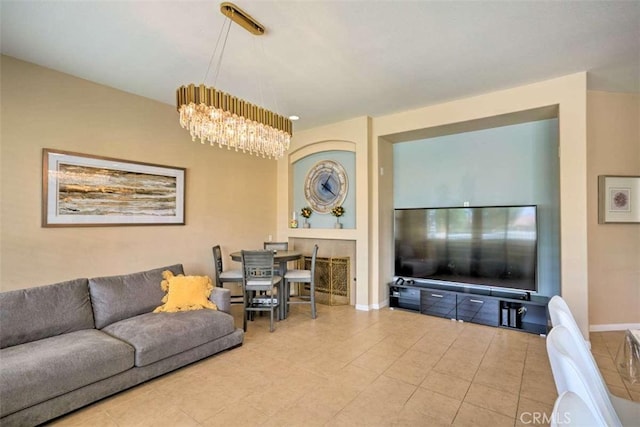 82756 Burnette Dr, Indio, CA 92201 - living room with tile patterned flooring and a chandelier