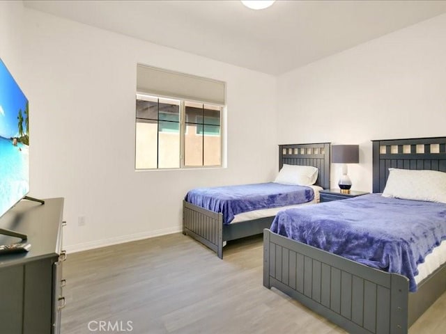 82676 Burnette Dr, Indio, CA 92201 - bedroom with wood finished floors and baseboards