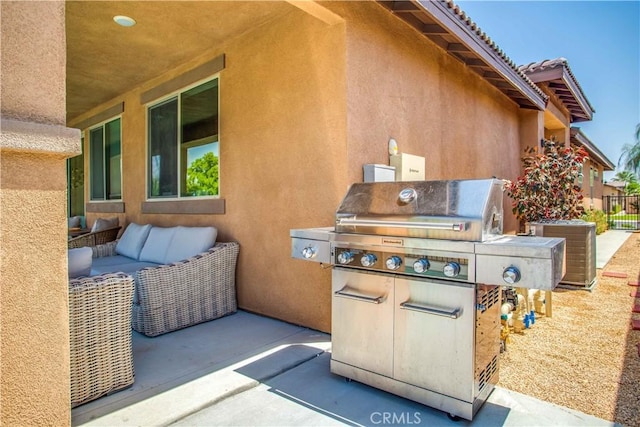 82676 Burnette Dr, Indio, CA 92201 - view of patio / terrace featuring area for grilling and outdoor lounge area