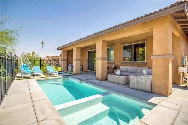 82676 Burnette Dr, Indio, CA 92201 - view of swimming pool with a patio, a pool with connected hot tub, and outdoor lounge area