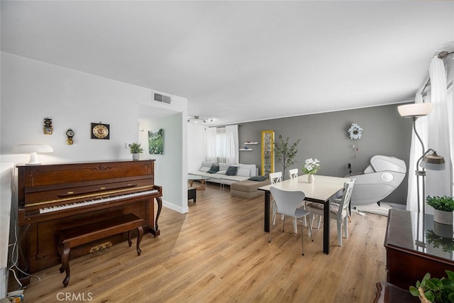 4481 Larwin Ave, Cypress, CA 90630 - dining area featuring light wood finished floors and baseboards