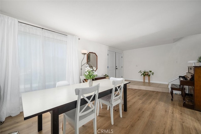4481 Larwin Ave, Cypress, CA 90630 - dining area with light wood-style floors