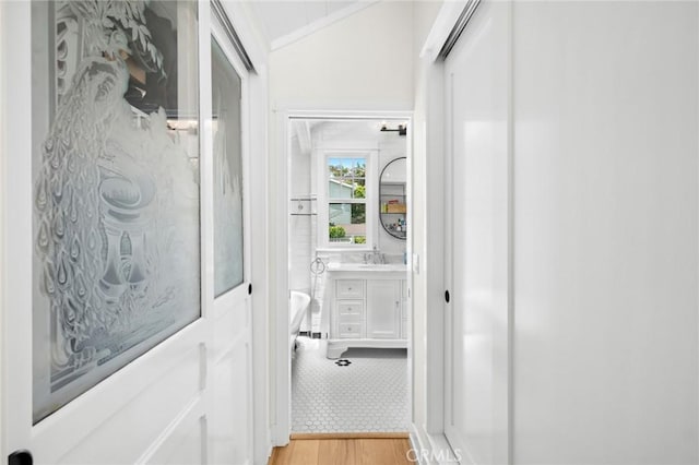 615 Seaview St, Laguna Beach, CA 92651 - hall featuring vaulted ceiling and light wood-style flooring
