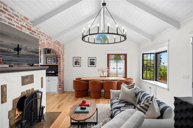 615 Seaview St, Laguna Beach, CA 92651 - living room featuring wood finished floors and a chandelier