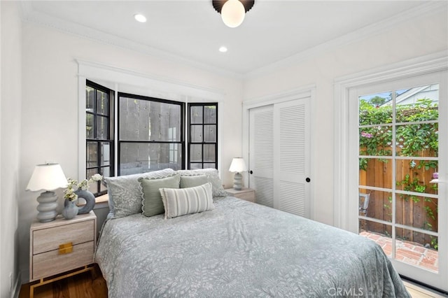 615 Seaview St, Laguna Beach, CA 92651 - bedroom featuring a closet, crown molding, and wood finished floors