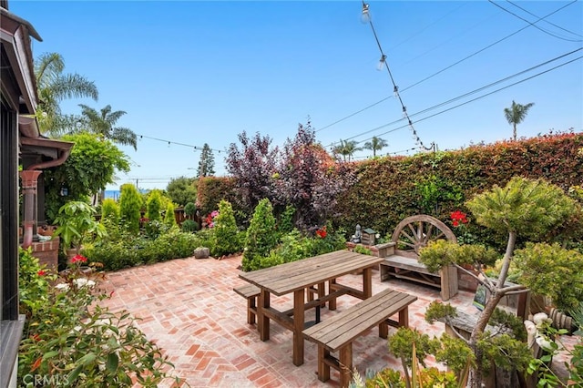 615 Seaview St, Laguna Beach, CA 92651 - fenced backyard featuring a patio and outdoor dining area
