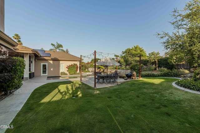 13115 Monarch Palm Ave, Bakersfield, CA 93314 - view of yard featuring a patio