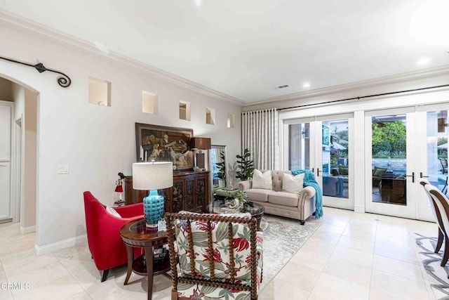 13115 Monarch Palm Ave, Bakersfield, CA 93314 - living area featuring ornamental molding, arched walkways, light tile patterned floors, and recessed lighting