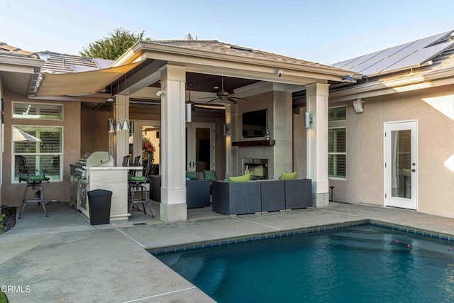 13115 Monarch Palm Ave, Bakersfield, CA 93314 - swimming pool featuring an outdoor living space, a patio, exterior kitchen, and a ceiling fan