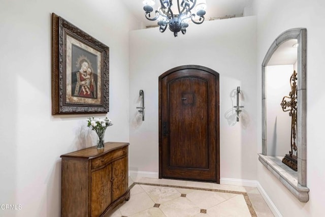 13115 Monarch Palm Ave, Bakersfield, CA 93314 - foyer with arched walkways and a chandelier