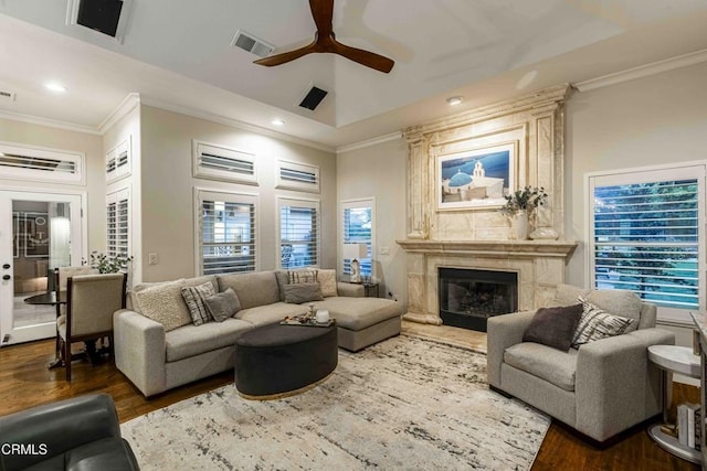 13115 Monarch Palm Ave, Bakersfield, CA 93314 - living room with ceiling fan, wood finished floors, crown molding, recessed lighting, and a premium fireplace