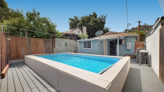7117 Shadygrove St, Tujunga, CA 91042 - view of pool with a grill, a fenced backyard, and a deck