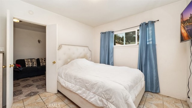 7117 Shadygrove St, Tujunga, CA 91042 - bedroom featuring light tile patterned floors
