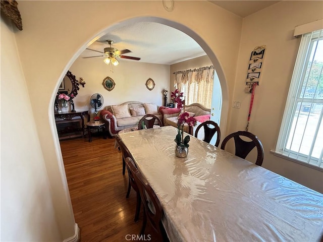 14047 Pierce St, Arleta, CA 91331 - dining room with arched walkways, wood finished floors, and ceiling fan