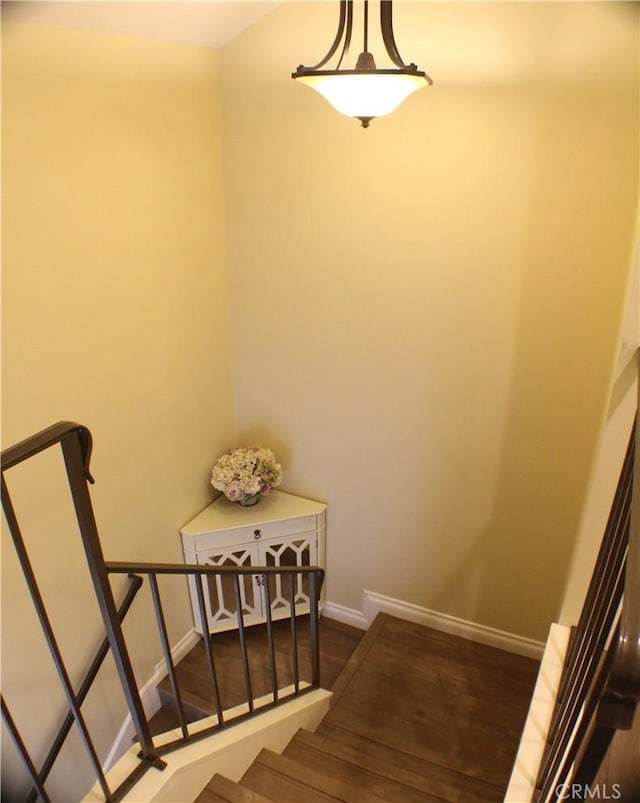 23266 Via Ronda, Mission Viejo, CA 92691 - staircase featuring baseboards and wood finished floors