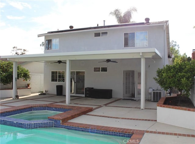 23266 Via Ronda, Mission Viejo, CA 92691 - back of house featuring a ceiling fan, stucco siding, and a patio area