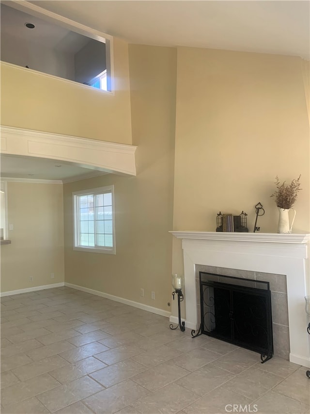 23266 Via Ronda, Mission Viejo, CA 92691 - unfurnished living room featuring a tile fireplace and a towering ceiling
