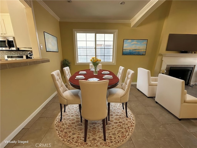 23266 Via Ronda, Mission Viejo, CA 92691 - tiled dining room featuring ornamental molding and a fireplace