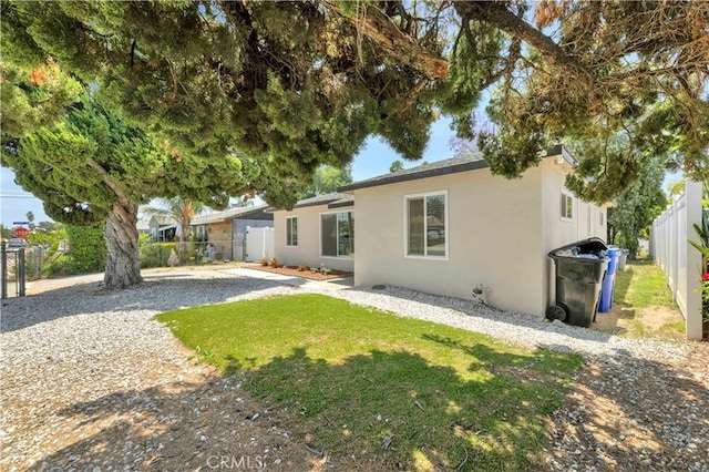 455 E Wilson St, Rialto, CA 92376 - view of front of house with stucco siding