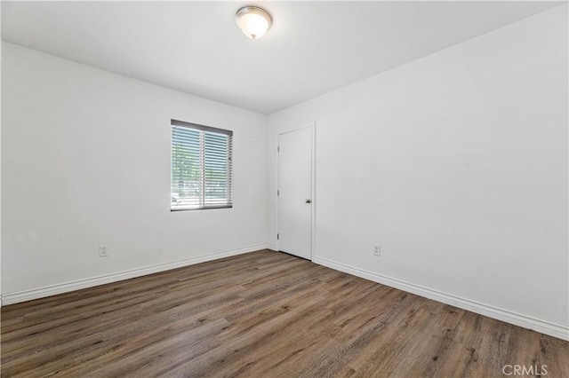 455 E Wilson St, Rialto, CA 92376 - unfurnished room featuring wood finished floors and baseboards