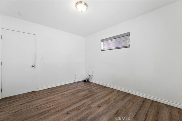 455 E Wilson St, Rialto, CA 92376 - unfurnished room featuring wood finished floors and a smoke detector