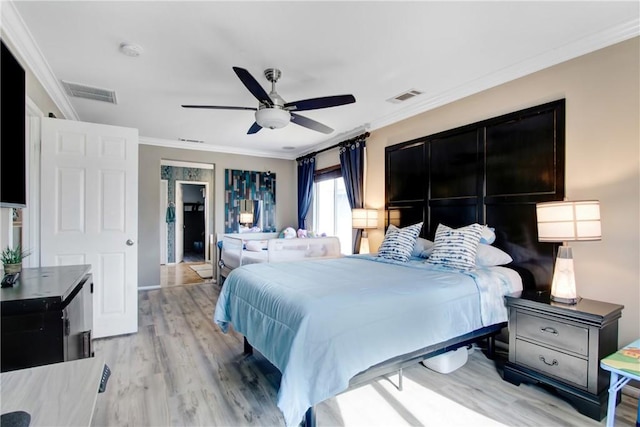 11543 Sky Pointe Dr, Desert Hot Springs, CA 92240 - bedroom with light wood-style floors, ornamental molding, and a ceiling fan