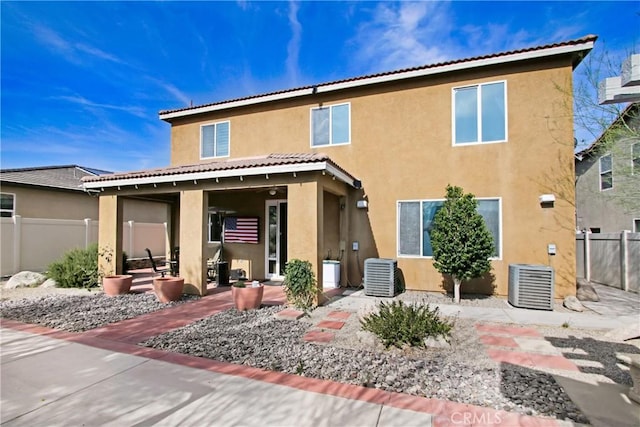 11543 Sky Pointe Dr, Desert Hot Springs, CA 92240 - back of property featuring stucco siding and a patio area