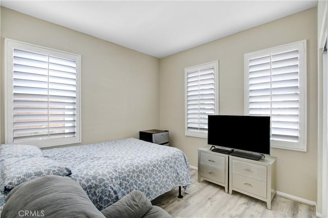 11543 Sky Pointe Dr, Desert Hot Springs, CA 92240 - bedroom featuring light wood-type flooring