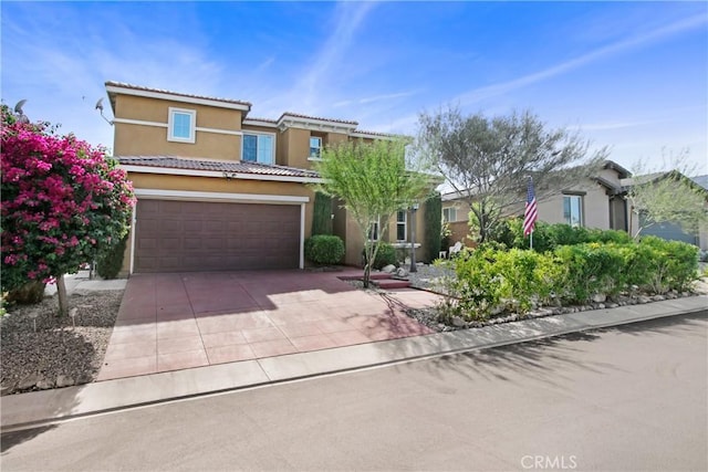 11543 Sky Pointe Dr, Desert Hot Springs, CA 92240 - view of front of home featuring stucco siding, driveway, and a tile roof