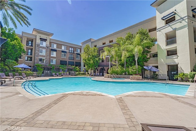 24595 Town Center Dr Unit 3205, Valencia, CA 91355 - community pool featuring a patio
