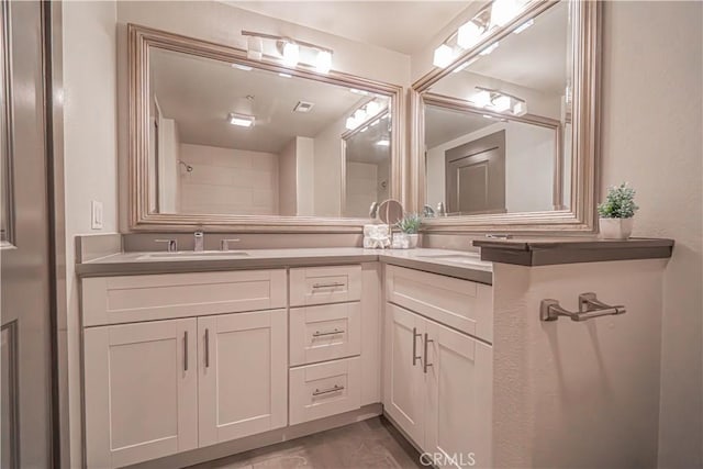 24595 Town Center Dr Unit 3205, Valencia, CA 91355 - bathroom featuring double vanity and a shower