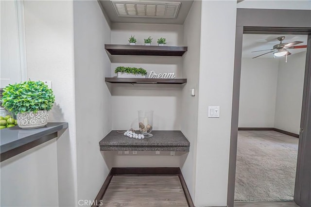 24595 Town Center Dr Unit 3205, Valencia, CA 91355 - corridor with wood finished floors and baseboards
