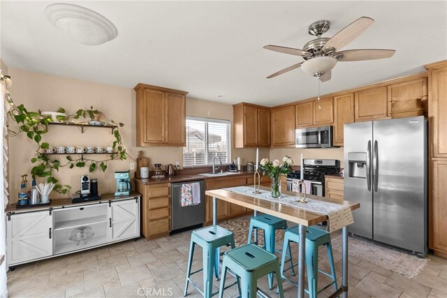 249 Colt Ln, Nipomo, CA 93444 - kitchen featuring stainless steel appliances, stone finish floors, ceiling fan, and open shelves