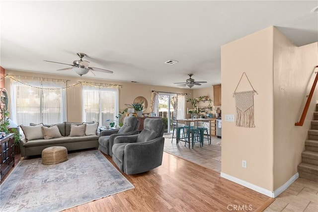 249 Colt Ln, Nipomo, CA 93444 - living area featuring ceiling fan, stairway, and light wood finished floors