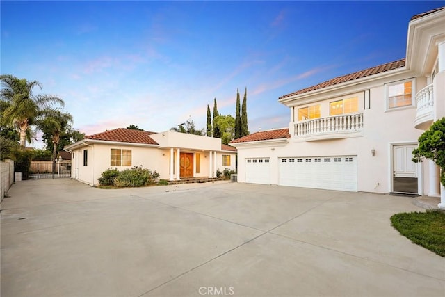 1118 S 6th Ave, Arcadia, CA 91006 - mediterranean / spanish-style home with driveway, a tiled roof, and stucco siding