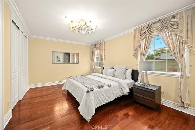 1118 S 6th Ave, Arcadia, CA 91006 - bedroom featuring a chandelier, wood finished floors, ornamental molding, and a closet